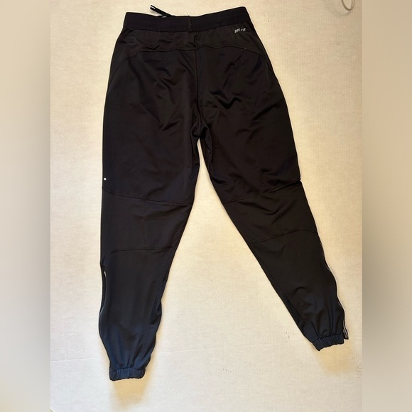 Nike women’s DriFit shield running jogger pants w/zip pockets & ankles Sz-XS X4 - Picture 4 of 12
